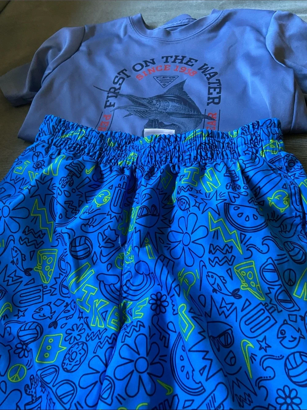 Nike Blue Shorts with Neon Green Doodle Print and Columbia shirt